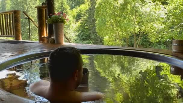 Man Bathing Cast Iron Vat Mineral Water Drinking Herbal Tea — Stock Video