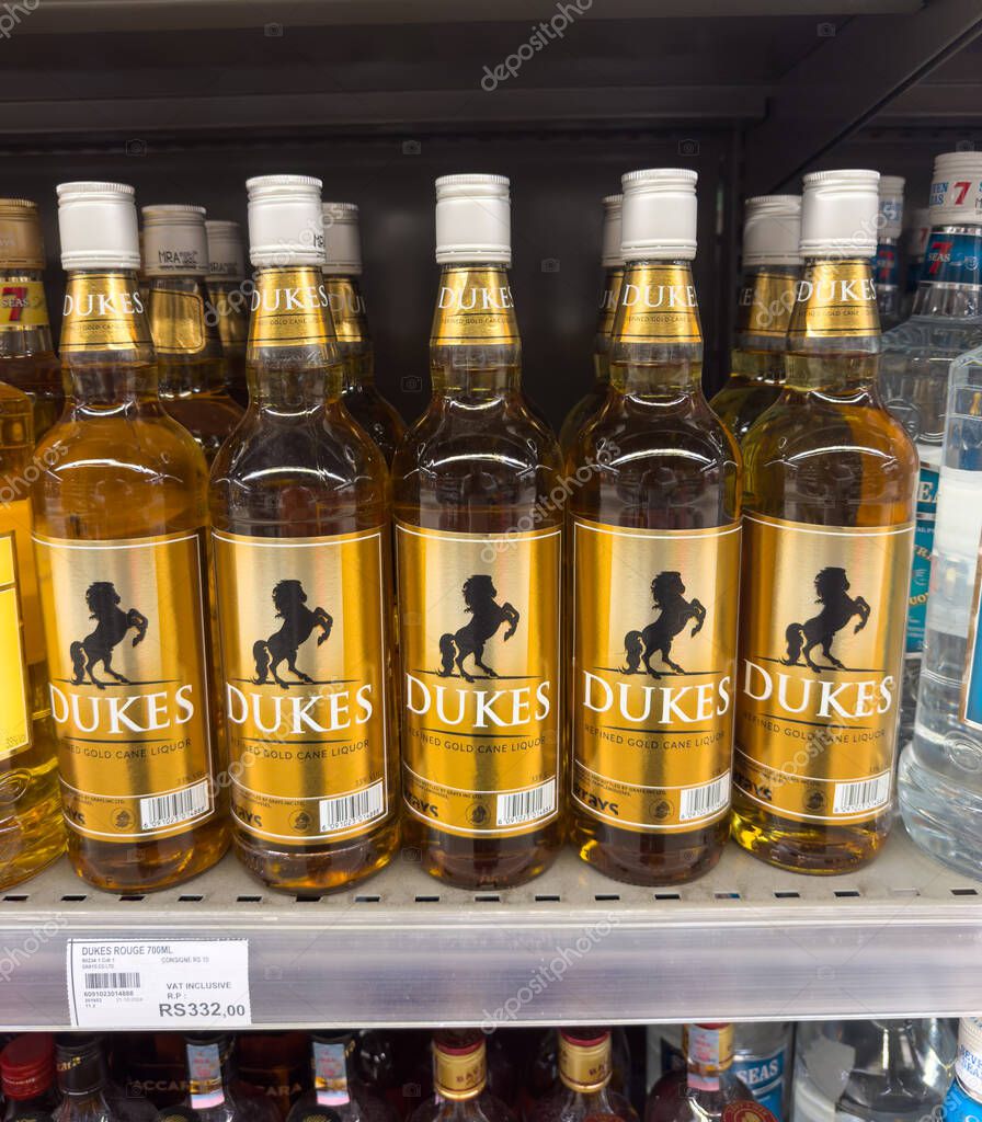 Grand Bay, Mauritius - January 29, 2025: Shelf View of Locally Produced DUKES Refined Gold Cane Liquor by Grays Inc Ltd. High quality photo