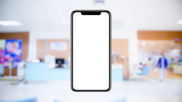 blurred hospital, cashier counter background image There is a phone mockup placed in the center for advertising. or promotion for hospital, clinic business, mocked up style