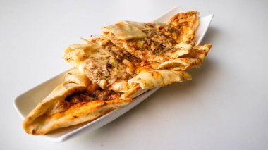 Türk pide with tuna- from the ofset Collection, Turkish bread pide, Turkish tuna pizza.