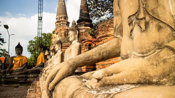 Row of ruined statue of buddha at Wat Yai Chaimongkol,Wat Yai Chai Mongkhon, Ayuthaya, Thailand,Asia