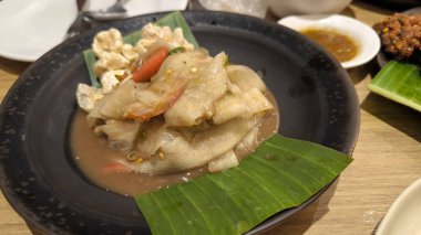 Luang Prabang papaya salatası, Papaya salatası Tayland ve Loas 'ta yaygın yemek.