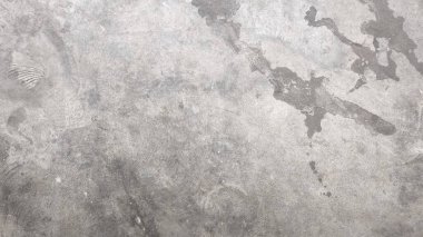 Doğal desenlere sahip kaba gri beton dokunun yakın çekimi, arka plan, duvar dokusu veya inşaat malzemesi tasarımı için ideal