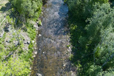 Clear water on the Jagala river on a summer day, photo from a drone. High quality photo
