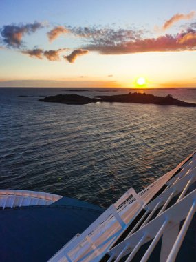 Vertical photo, sea sunset, view from the ferry. High quality photo