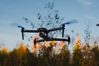 Estonia, Tallinn October 22, 2023. Autel evo lite plus quadcopter over the autumn forest. High quality photo