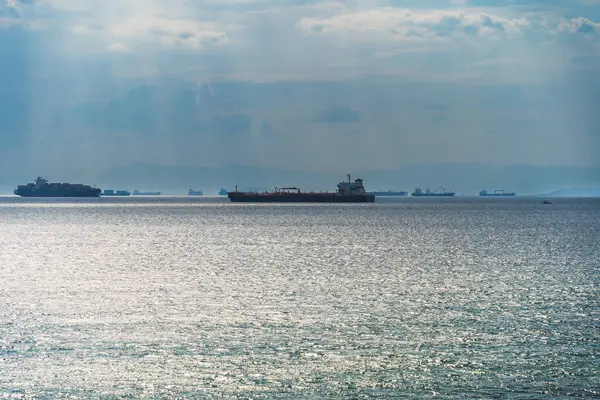 Stock image Marine logistics, tankers and container ships approaching the port of Athens. The sky is overcast. High quality photo