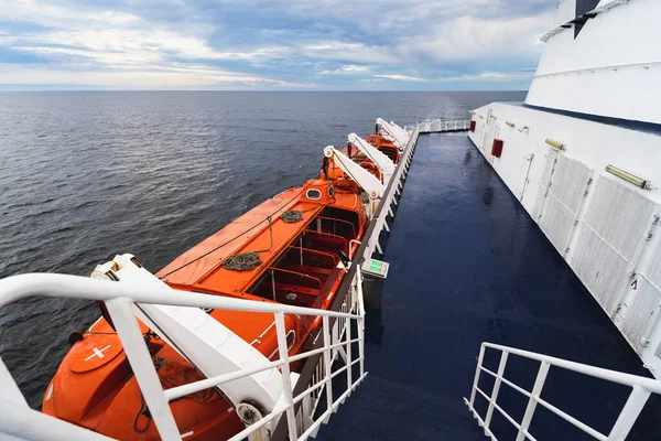 Cruise ship deck and lifeboats, action on the high seas. High quality photo