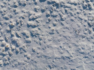 Kar tarlasının foto dokusu, kopyalama alanı. Drone fotoğrafı. 