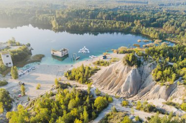 Estonia, Rummu September 8, 2024. Rummu quarry and underwater prison is a place for swimming, snorkeling, diving and other various recreation with the most transparent clean water in Estonia. clipart