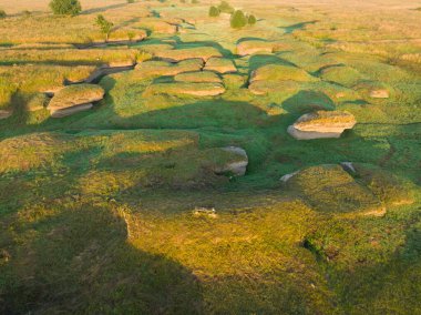 Drone view: Dried riverbed in karst area, bizarre relief and traces of ancient stream. clipart