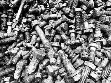 Paslı fındık ve vida arka plan. Eski paslanmış soyut metal dokusu.