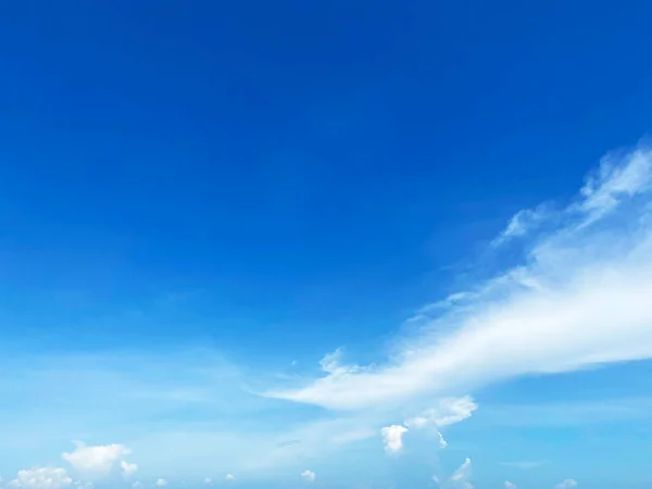 Beautiful clouds during spring time in a Sunny day. Blue sky and white fluffy clouds.
