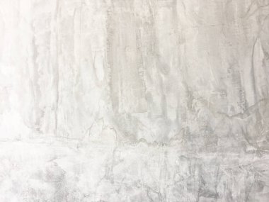 Beton duvara pankart yerleştirmek için kullanılan eski bir duvar gibi doğal çimento veya taş dokunun beyaz beton dokusu..