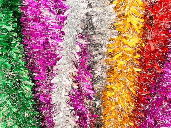 Colorful tinsel background for party happy new year,chrismas.