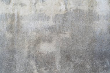 Pürüzsüz, pürüzsüz bir duvarın boyanmış yüzeyinin dokusu. Yardım uçağı. Dengeli gri renk. Işık refleksi. Beyaz Tasarım Arkaplanı. Sanatsal alçı. Seçili resim.