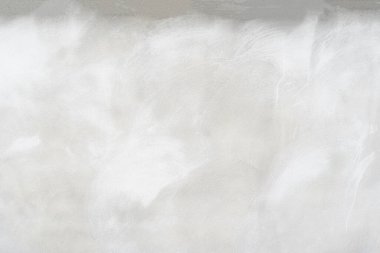 Beton duvara pankart yerleştirmek için kullanılan eski bir duvar gibi doğal çimento veya taş dokunun beyaz beton dokusu..