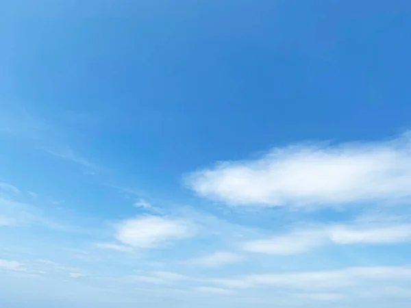 Beautiful clouds during spring time in a Sunny day. Blue sky and white fluffy clouds