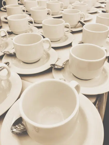 Group of empty coffee cups of white cup for service tea or coffee in breakfast or buffet and seminar event of catering and cocktail.