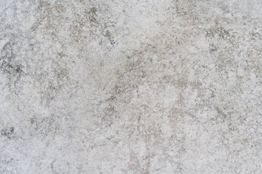 Eski gri beton duvarın dokusu. Ürününüz veya altyapınız için doğal çimento veya taş eski doku malzemesinin klasik beyaz arka planı.