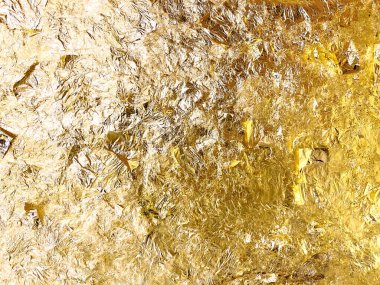 Altın yaprağın dokusu, altın arkaplan, Buda görüntüsü..