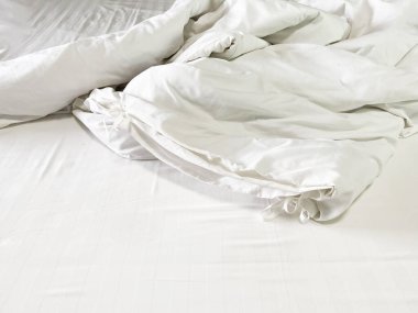 white blanket bed after wake up. clipart