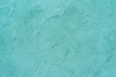 Arka plan için beton duvarın yeşil boya dokusu.