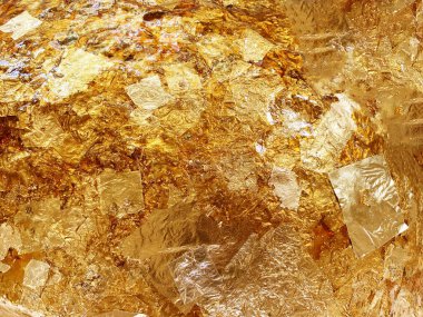 Altın yaprağın dokusu, altın arkaplan, Buda görüntüsü..