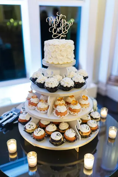 Cupcake tier wedding cake with candles