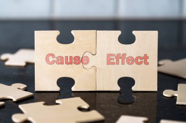 Etki Etkisi Bağlantısı, Tahta Bulmaca Parçaları Sembolizmi