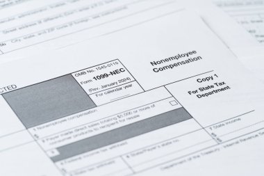 Form 1099-NEC, Nonemployee Compensation, IRS Tax Return Filing Document Close-Up clipart