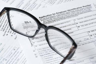 SS-4 Form, Application for Employer Identification Number, IRS Tax Document Close-Up clipart