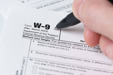 W9 Tax Form, IRS Taxpayer Identification, Federal Document, Paper Close-Up clipart