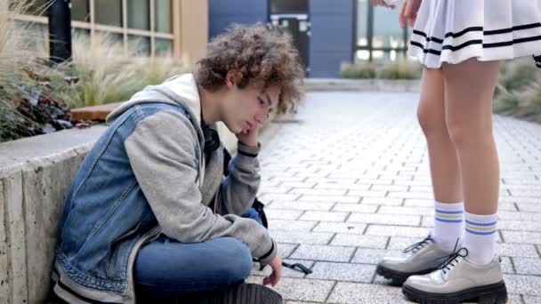 Sad Guy High School Student Sits Sidewalk Schoolyard Waits His — Stock Video