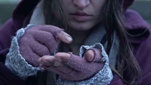 Homeless Woman Shivering Cold Counts Coins Collected Handouts — Stock Video