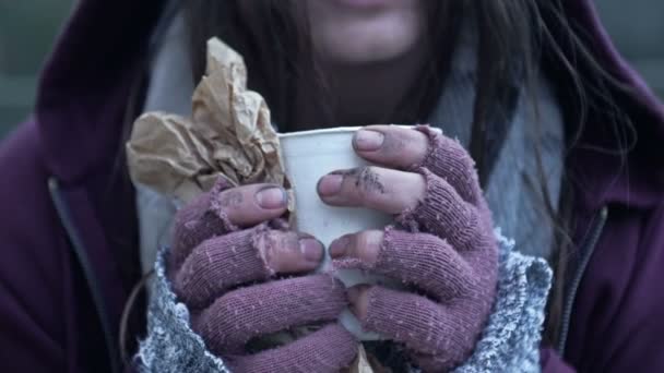 Homeless Young Woman Shivering Cold Holds Paper Cup Some Kind — Stock Video