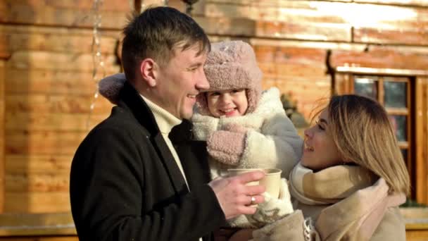 Beautiful Young Couple Little Daughter Christmas Fair Parents Drinking Mulled — Stock Video