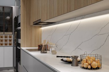 Ahşap dolap ve beyaz mutfak adası. Utensillerin bulunduğu yer, mutfak içi.