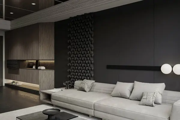 Gray modular sofa next to shoe cabinet with black wall background interior in a modern living area.