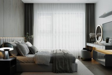 Platform yatağı, abartısız tasarımıyla, gri ve beyaz tonlarında organik pamuk çarşaflar giyer..