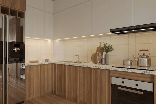 Modern kitchen interior. Stylish white kitchen cabinets with brass knobs, granite island