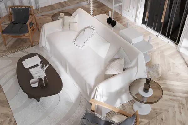 This luxurious apartment with designer white furniture and parquet flooring.