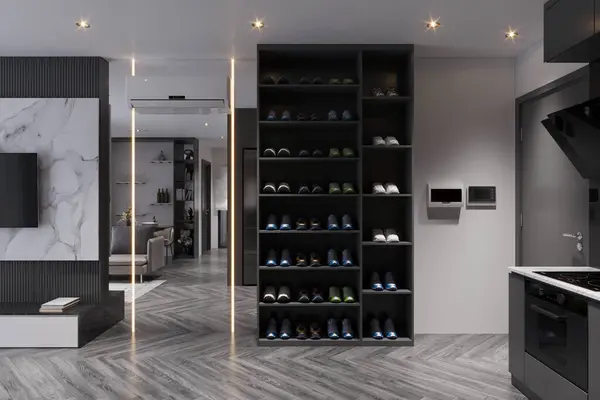 A luxury shoe rack with shoes next to the kitchen.