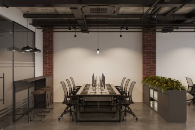 Ofisteki modern iş yerinin içinde beton döşeme var.