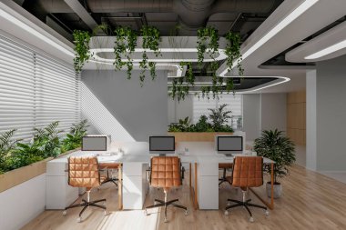 Modern bir açık-plan ofis, bol doğal ışık, minimum iç mekan.