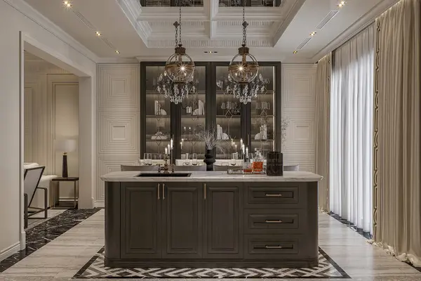 stock image Dark wood cabinets with marble top in kitchen with two crystal chandeliers.