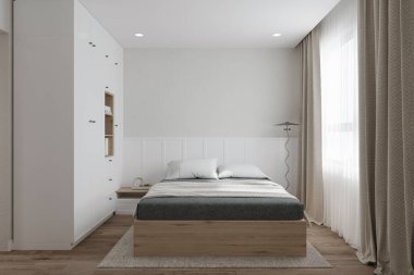 Beyaz ve ahşap yatak odası, gardırobu olan.