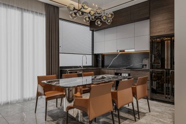 Mutfağın iç kısmının köşesinde etrafında sandalyeler olan bir yemek masası var..