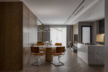 Açık kat planı yemek alanı ile mutfak arasında pürüzsüz bir akış olduğunu gösteriyor.