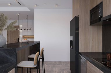 Karanlık dolapları, siyah tezgahı ve bar taburesi olan modern bir mutfak tasviri..